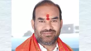 Sircilla Collector Jha Gets Notice For Protocol Violation