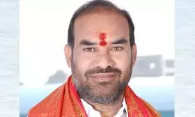 Sircilla Collector Jha Gets Notice For Protocol Violation