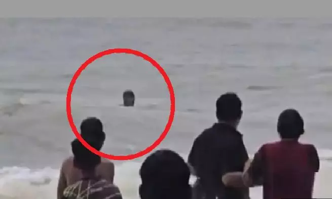 Tourist Rescued From Drowning By Lifeguards At Puri Beach Tourist Rescued From Drowning By Lifeguards At Puri Beach