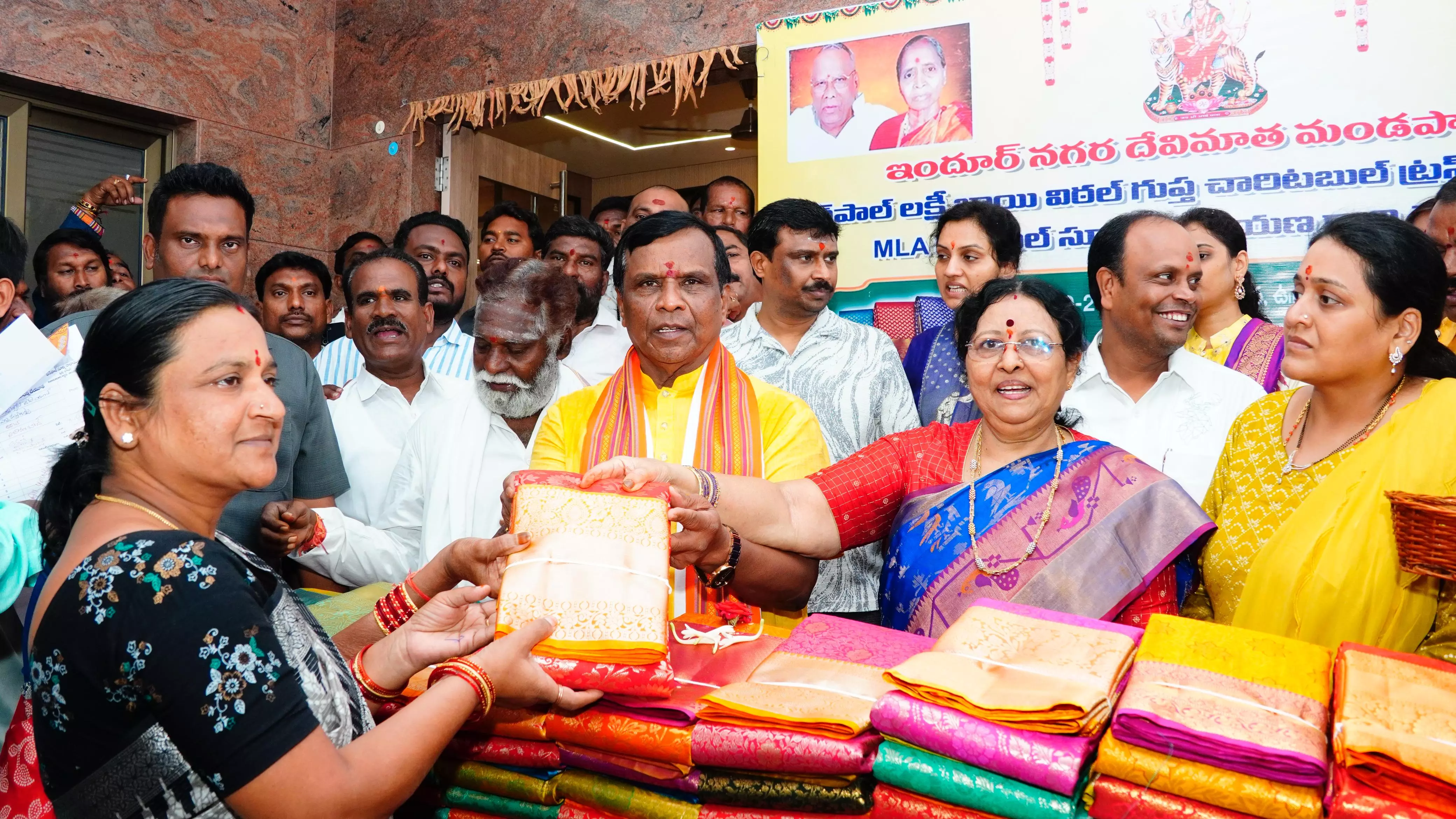 Urban MLA Distributes Silk Saris To Devi Mata Pandals