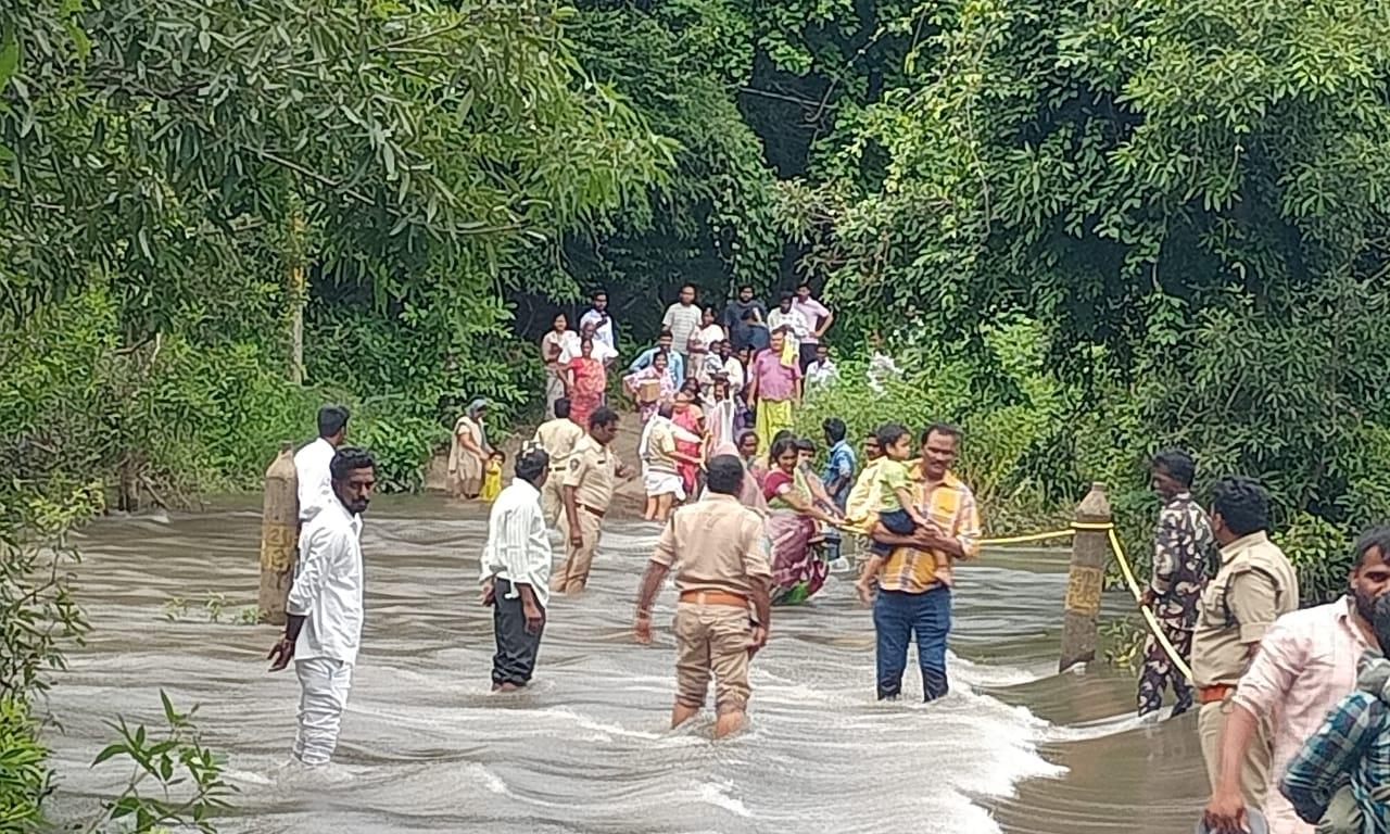 Devotees Rescued from Flooding at Nemaligundla Temple