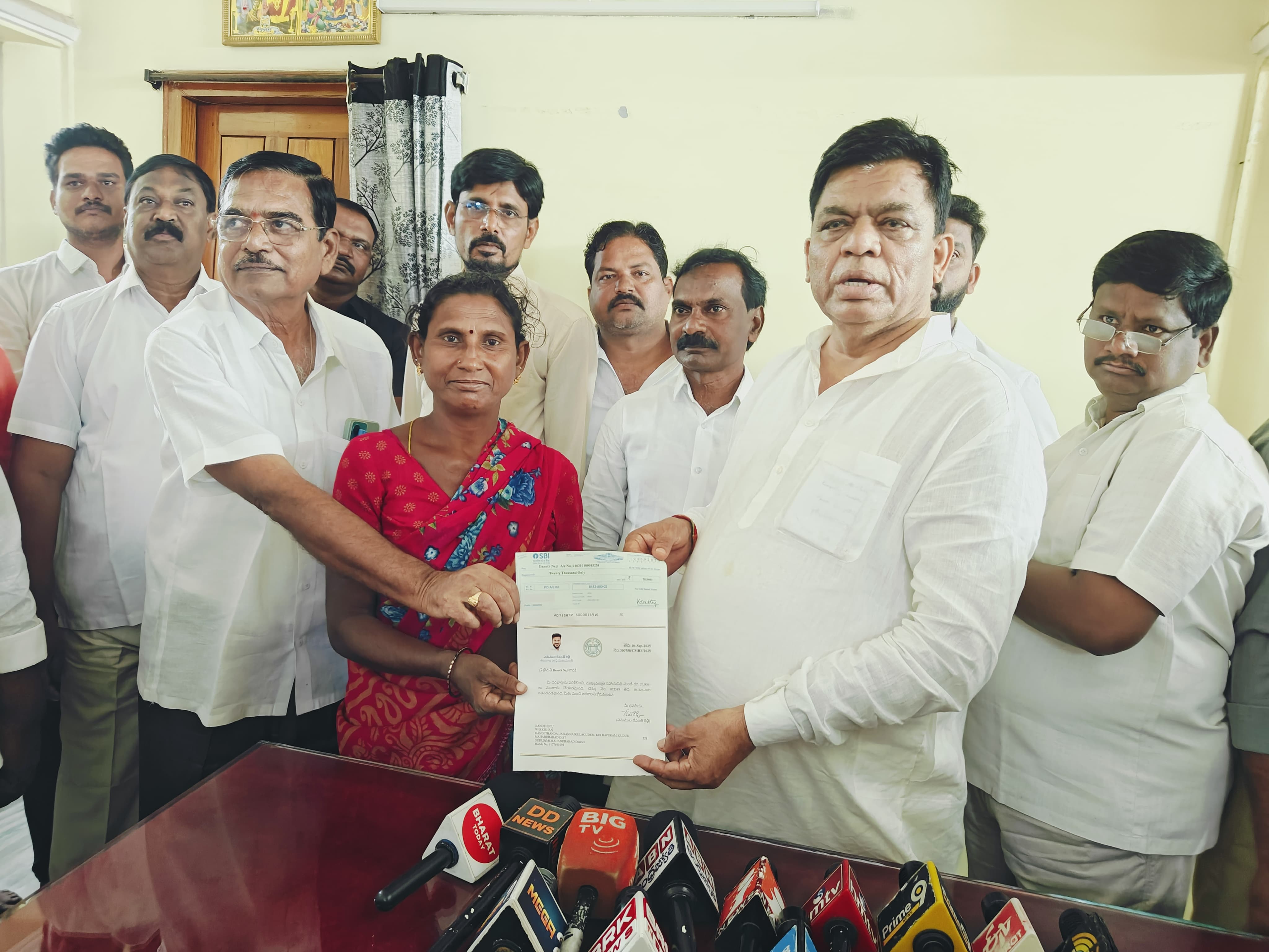 MP Distributes Relief Funds to Needy Families in Warangal