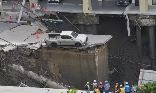 Bangkok Road Collapse Triggers Massive Sinkhole, Evacuations