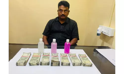 Yellampet Municipality Town Planning Officer Held in Bribe Case Yellampet Municipality Town Planning Officer Held in Bribe Case