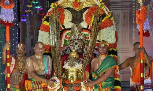 Thousands Brave Rain, Cold To Witness Garuda Vahana Seva At Tirumala