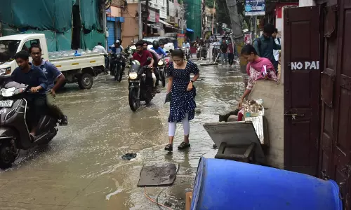 Flooded Musi River Leaves Behind a Trail of Muck and Debris
