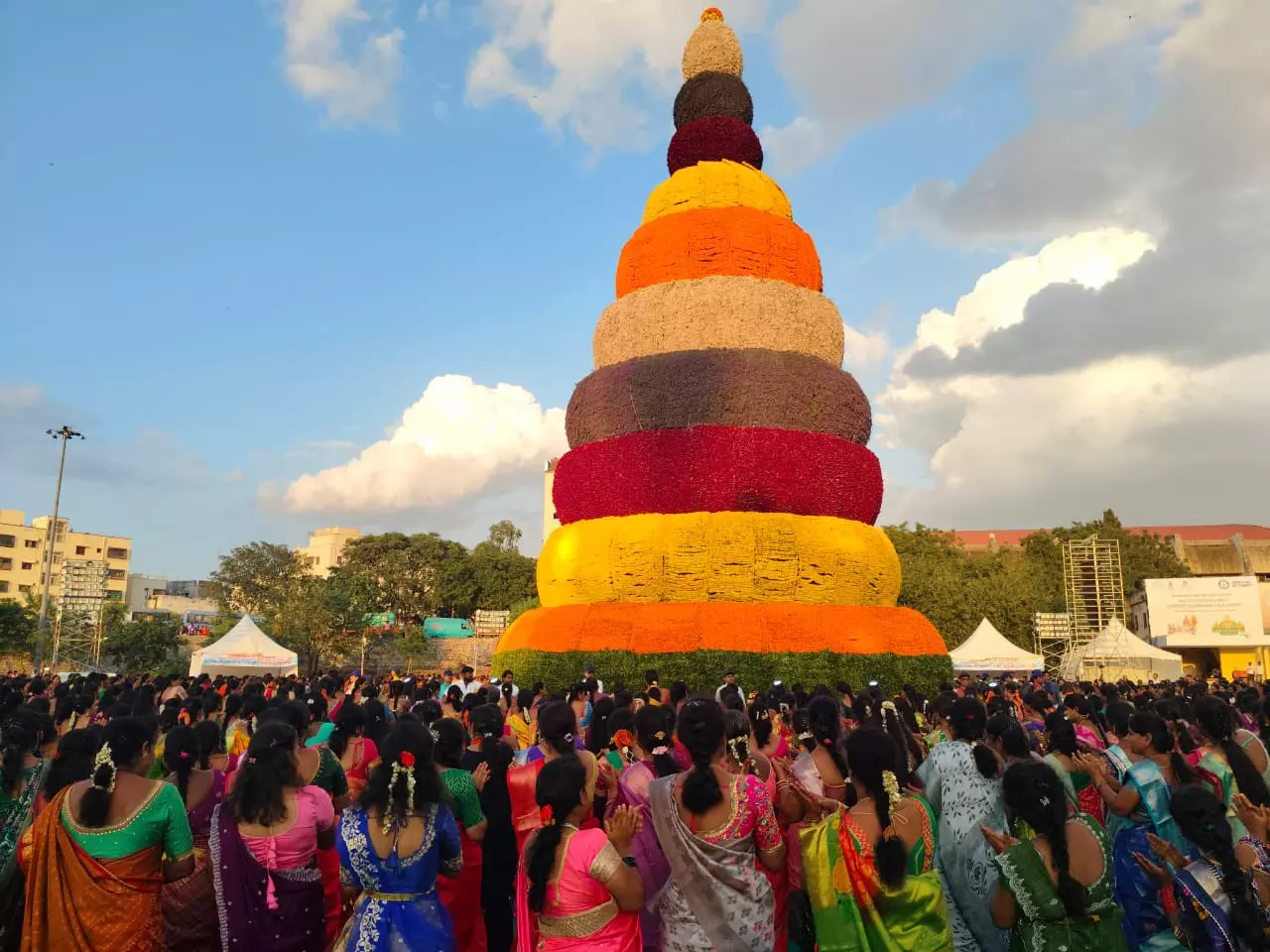 1,354 Women and 63-ft Floral Bathukamma Set Guinness World Record in Hyderabad 1,354 Women and 63-ft Floral Bathukamma Set Guinness World Record in Hyderabad