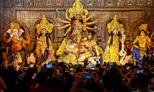 Divine Designs Meld with AI at Durga Puja Festival