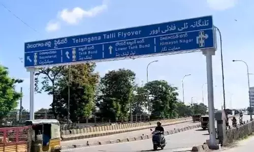 GHMC Installs Telangana Thalli Name Board on Flyover