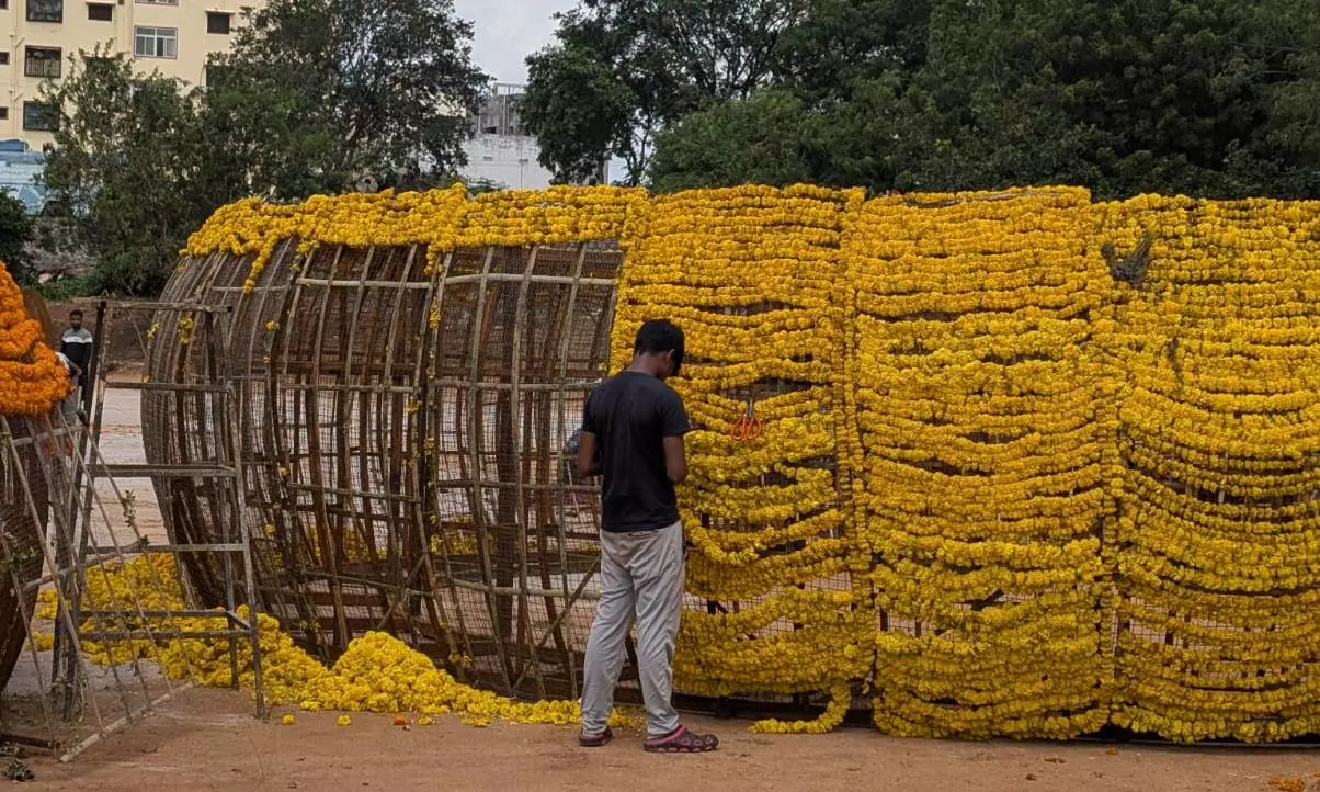 Telanganas Guinness Record Bathukamma Dismantled, Taken for Biodegradable Use Telanganas Guinness Record Bathukamma Dismantled, Taken for Biodegradable Use