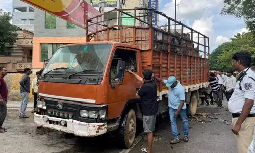 Liquor-Laden Truck Catches Fire in Habsiguda, Bottles Looted by Locals