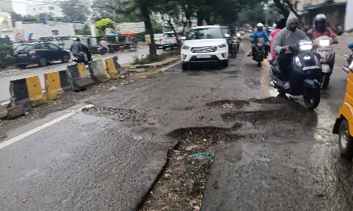 Falling in Potholes, Splashed by Dirty Water: Hyderabad Bikers’ Plight Falling in Potholes, Splashed by Dirty Water: Hyderabad Bikers’ Plight