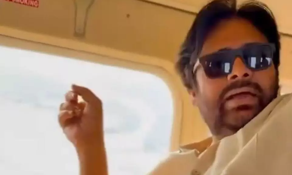 Pawan Kalyan Makes Aerial Survey on Fishing Harbour Pawan Kalyan Makes Aerial Survey on Fishing Harbour