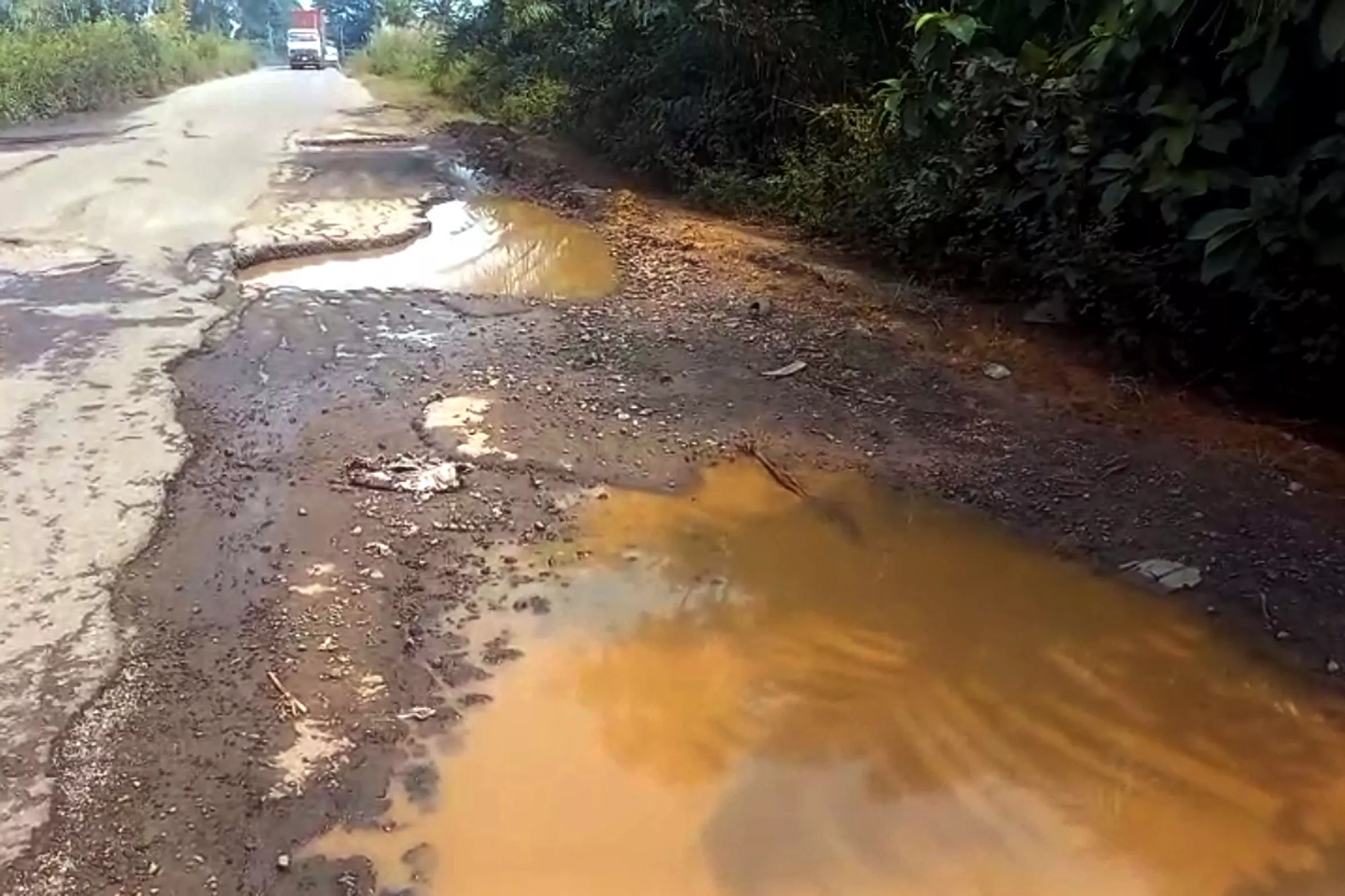 Potholed Highway near Ardham in Manyam Posing Risk to Commuters Potholed Highway near Ardham in Manyam Posing Risk to Commuters