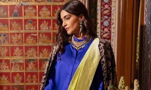 Sonam Pairs Saree With  A High-Neck Shirt For Diwali Dinner