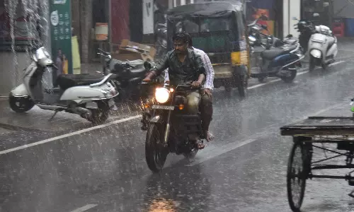 Sudden Showers Drench Hyderabad After Clear Skies
