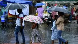 Continuous Downpour Disrupts Life In Godavari Districts Continuous Downpour Disrupts Life In Godavari Districts