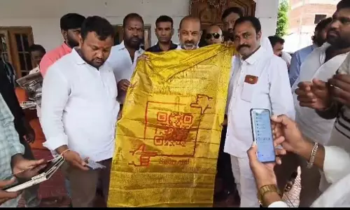 Sircilla Weaver Crafts QR Shawl for PM Modi