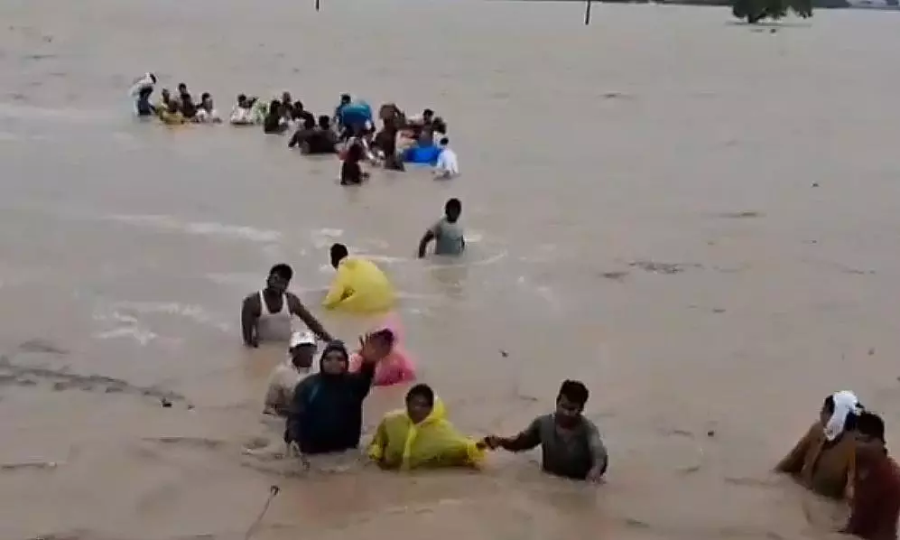 CM Naidu Lauds Rescue Of 15 People Trapped In Marooned Church CM Naidu Lauds Rescue Of 15 People Trapped In Marooned Church