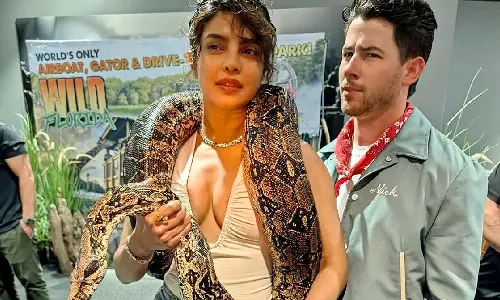 Priyanka Chopra Gets Up Close and Personal with a Large Snake