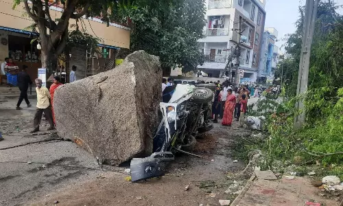 Boulder Rolls Down Hill, Flattens GHMC Truck In Malkajgiri