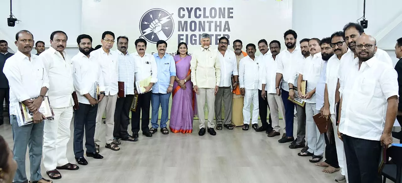 CM Honours Naidu Durgesh, Anitha for Exemplary Service During Cyclone Montha CM Honours Naidu Durgesh, Anitha for Exemplary Service During Cyclone Montha