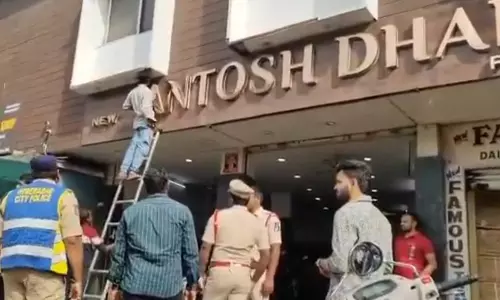 Officials Remove Signboards With Santosh Dabha Name Across Hyderabad