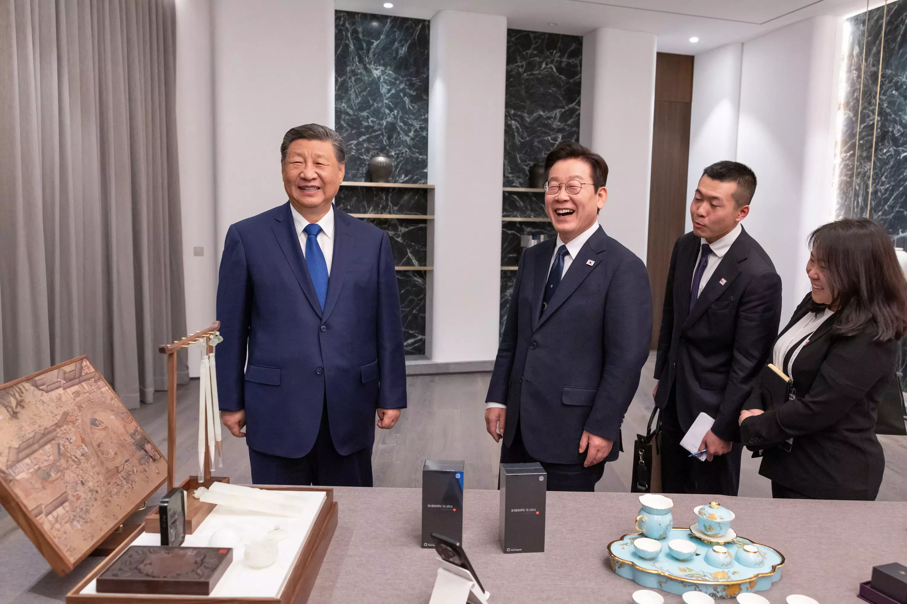 Xi Jokes About Spying with Phone Gift for South Koreas Lee Xi Jokes About Spying with Phone Gift for South Koreas Lee