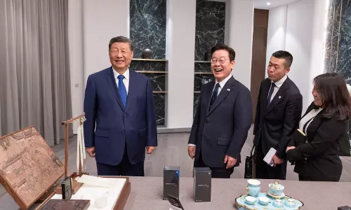 Xi Jokes About Spying with Phone Gift for South Koreas Lee Xi Jokes About Spying with Phone Gift for South Koreas Lee