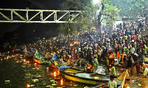 AP: Huge Rush at Bathing Ghats, Shiva Temples