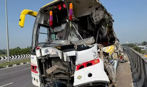 8 Injured as Private Bus Rams Lorry Near Nandigama