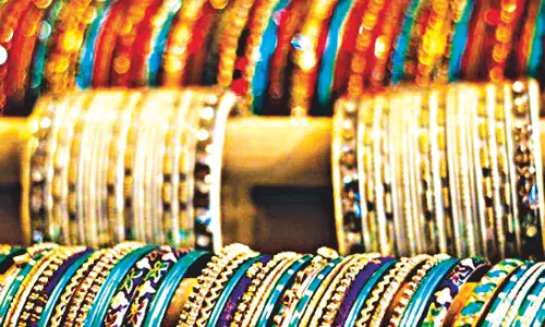 Glass Bangles Make a Wrist-Oric Comeback Glass Bangles Make a Wrist-Oric Comeback