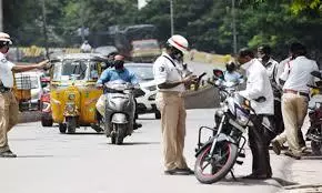 Hyderabad Traffic Cop To Create Awareness Among Vehicle Owners On Pending Challans