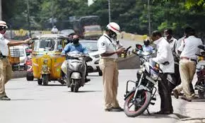 Hyderabad Traffic Cop To Create Awareness Among Vehicle Owners On Pending Challans