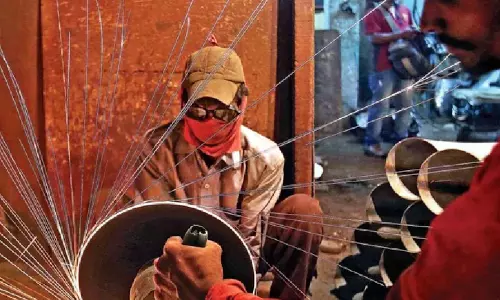 Workers Torch Labour Code Orders At Parawada SEZ In Anakapalle Workers Torch Labour Code Orders At Parawada SEZ In Anakapalle