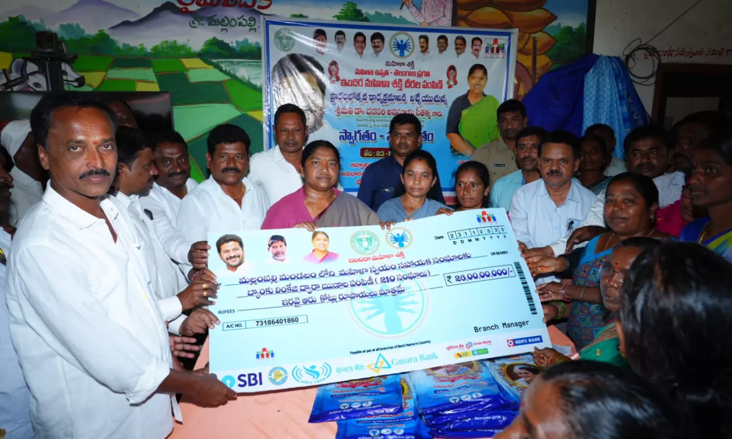 Minister Seethakka Distributes ₹26 Crore Loans to SHGs