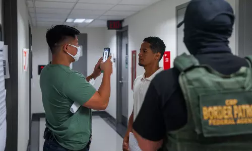 US Halts Asylum Decisions as Troop Killing Sparks Migrant Crackdown