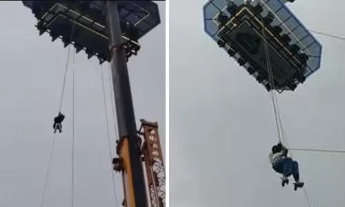Tourists Rescued After Sky-Dining Crane Malfunctions in Kerala’s Idukki Tourists Rescued After Sky-Dining Crane Malfunctions in Kerala’s Idukki