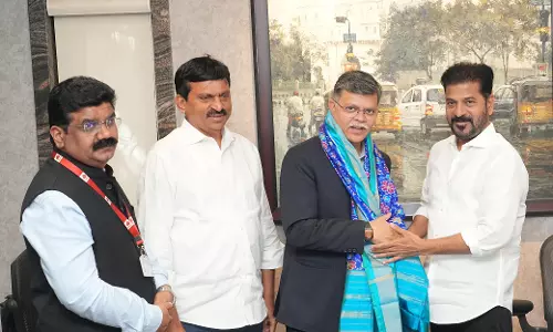 Revanth Reddy Urges HUDCO to Grant Loans at Low Interest Rates