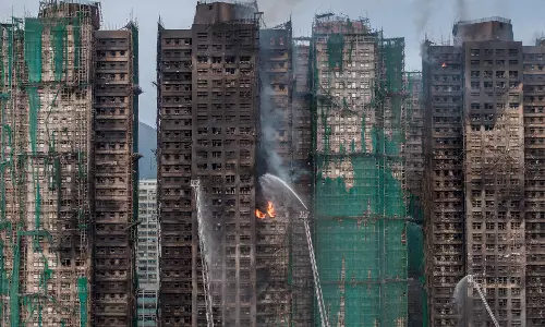 Hong Kong To Set Up Inquiry into Deadly Fire Hong Kong To Set Up Inquiry into Deadly Fire