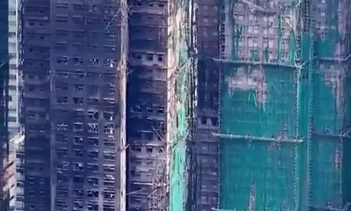 Hong Kong Fire Death Toll Hits 159 After Towers Searched Hong Kong Fire Death Toll Hits 159 After Towers Searched