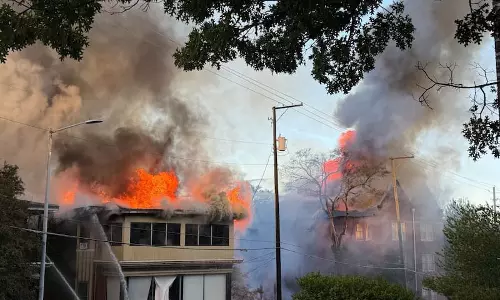 Two Telugu Students Killed in Major Apartment Fire in USA