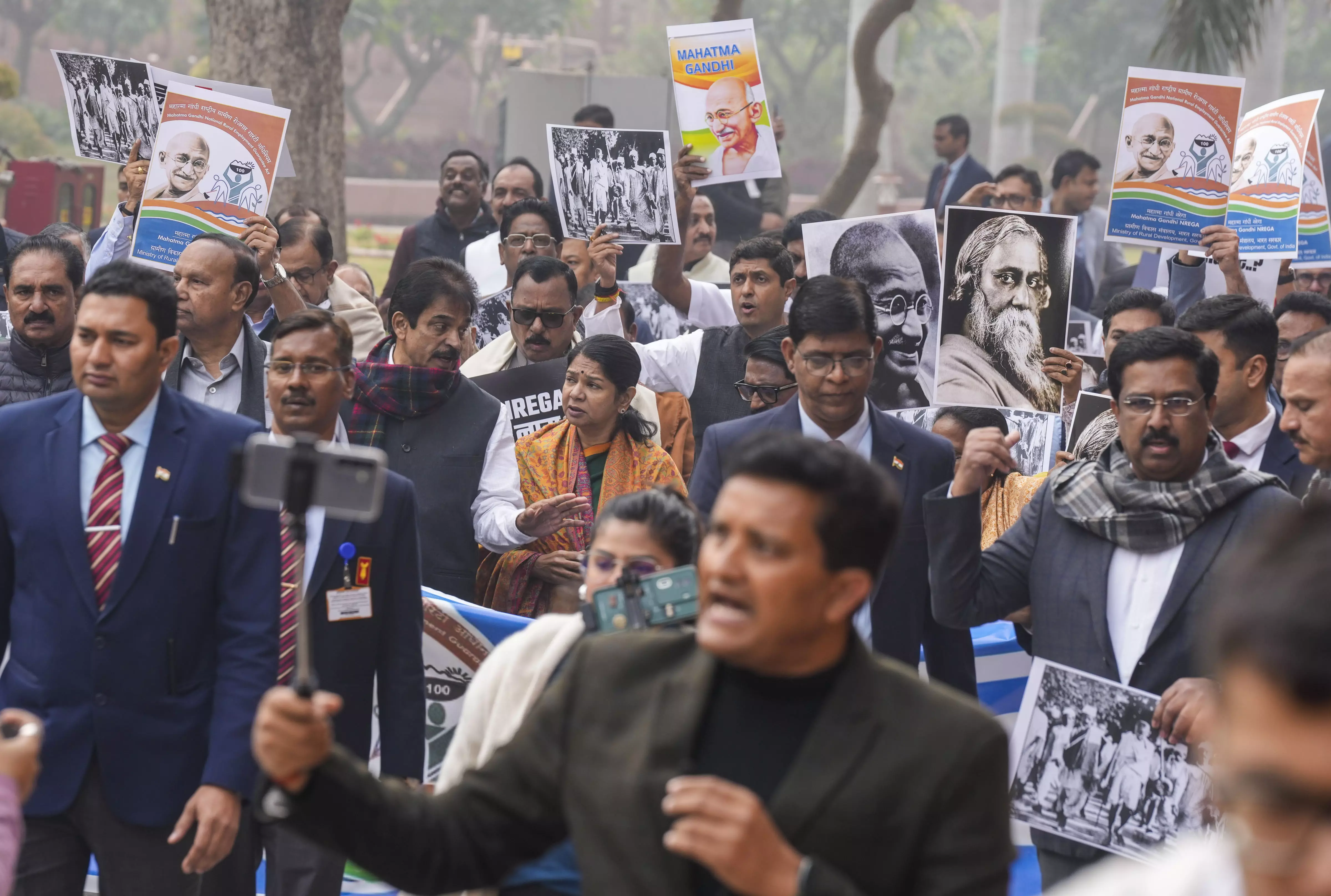 Opposition MPs March in Parliament, Seek Withdrawal of G RAM G Bill Opposition MPs March in Parliament, Seek Withdrawal of G RAM G Bill