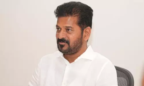 CM Revanth Calls KTR, KCR as Financial Terrorists