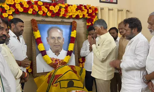 Naidu Pays Floral Tribute to NTR Raju in Tirupati