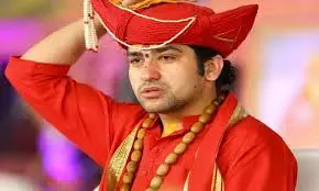 Video Of Dhirendra Shastri Arriving In Raipur In Govt Aircraft, Cop Touching His Feet Sparks Row