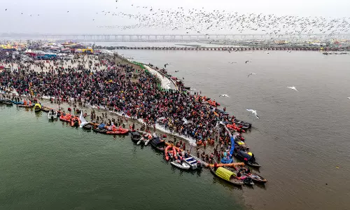 Lakhs Bathe in Freezing Sangam Waters as Magh Mela Begins in Prayagraj Lakhs Bathe in Freezing Sangam Waters as Magh Mela Begins in Prayagraj