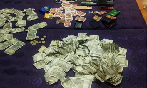 Gamblers Attempt To Flush Cash During Police Raid In Odisha’s Sambalpur Gamblers Attempt To Flush Cash During Police Raid In Odisha’s Sambalpur