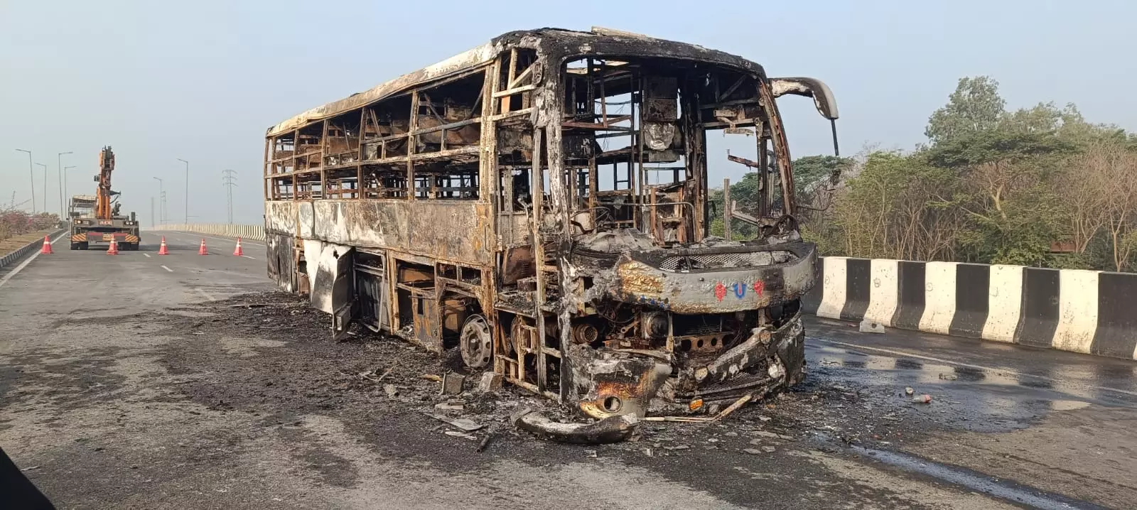 Travels Bus Gutted in Fire on Kovvur Flyover