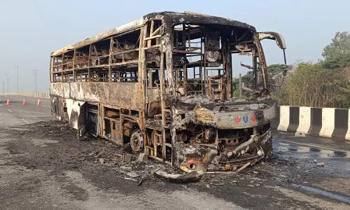 Travels Bus Gutted in Fire on Kovvur Flyover